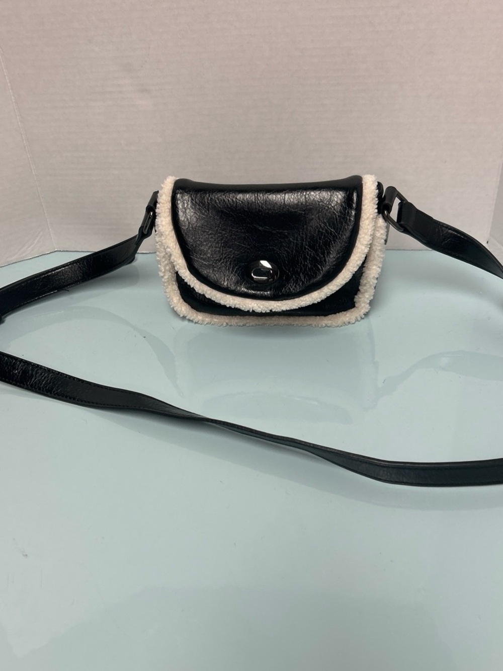MMS Design Studio Black Crossbody Bag with White Shearling Trim